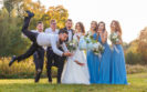 groom falling over cake