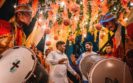 men celebrating at indian wedding